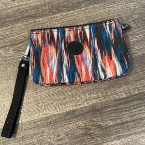 Small accessory bag that will fit in most purses and bags!